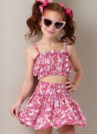 Model is wearing short Girls set with balloon skirt sewn with the sewing pattern Butterick 7050