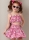 Model is wearing short Girls set with balloon skirt sewn with the sewing pattern Butterick 7050