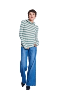 Model is wearing feminine Pullover with special details sewn with the sewing pattern Burda 5680