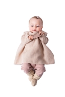 Model is wearing cute Baby dress with flutter sleeves sewn with the sewing pattern Burda 9201
