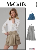 Model is wearing unusual pleated skirt with deep box pleats sewn with the sewing pattern McCalls 8584
